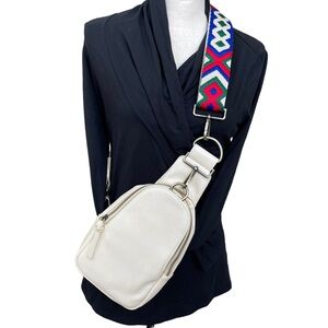 Stylish White Crossbody Bag with Colorful Strap